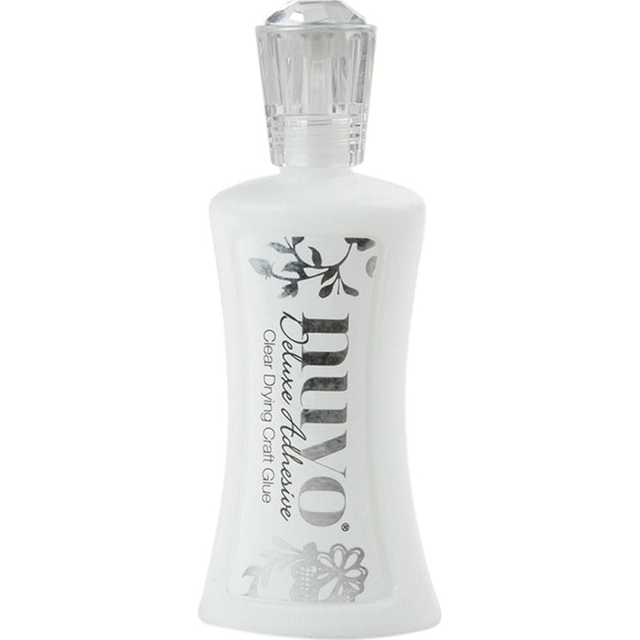 Nuvo - Deluxe Adhesive. Easy to use, reliable and versatile craft glue. Perfect for all your crafting projects. Dries clear. This package contains 2oz of deluxe adhesive. Available at Embellish Away located in Bowmanville Ontario Canada.