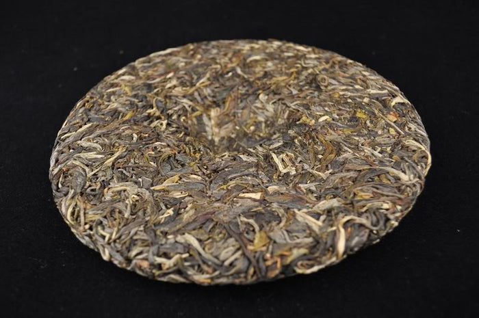 2012 Yunnan Sourcing "San He Zhai" Raw Pu-erh Tea Cake