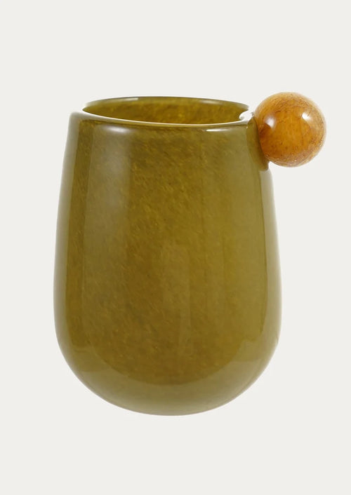 A glossy olive green glass vase with a small contrast colored ball handle on the side.