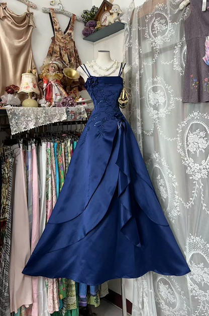 Dark blue halter-neck fitted A-line long ball gown