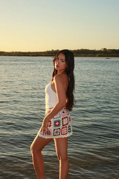 Beginning Boutique Davina White Crochet Mini Skirt white crochet mini skirt with colourful granny square pattern and scallope