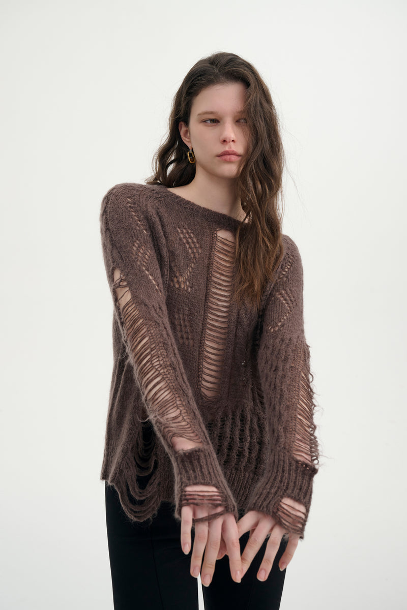 Distressed relaxed sweater