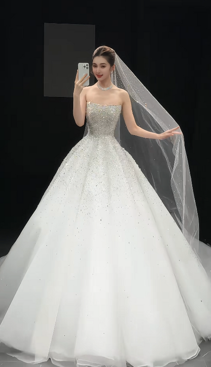 Elegant White Wedding Dress Long Tulle Sequins Strapless Bridal Dress A-Line Sleeveless Bridal Gown