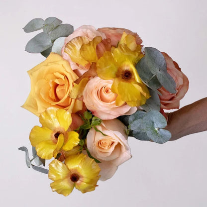 Peach Flower Centerpiece in Hand
