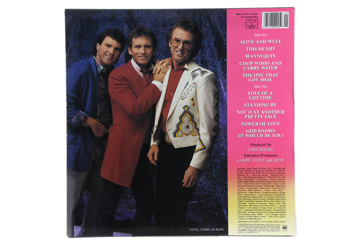 Larry Gatlin And The Gatlin Bros.*    -   Alive & Well...Livin' In The Land Of Dreams