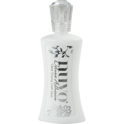 Nuvo - Deluxe Adhesive. Easy to use, reliable and versatile craft glue. Perfect for all your crafting projects. Dries clear. This package contains 2oz of deluxe adhesive.  Available at Embellish Away located in Bowmanville Ontario Canada.